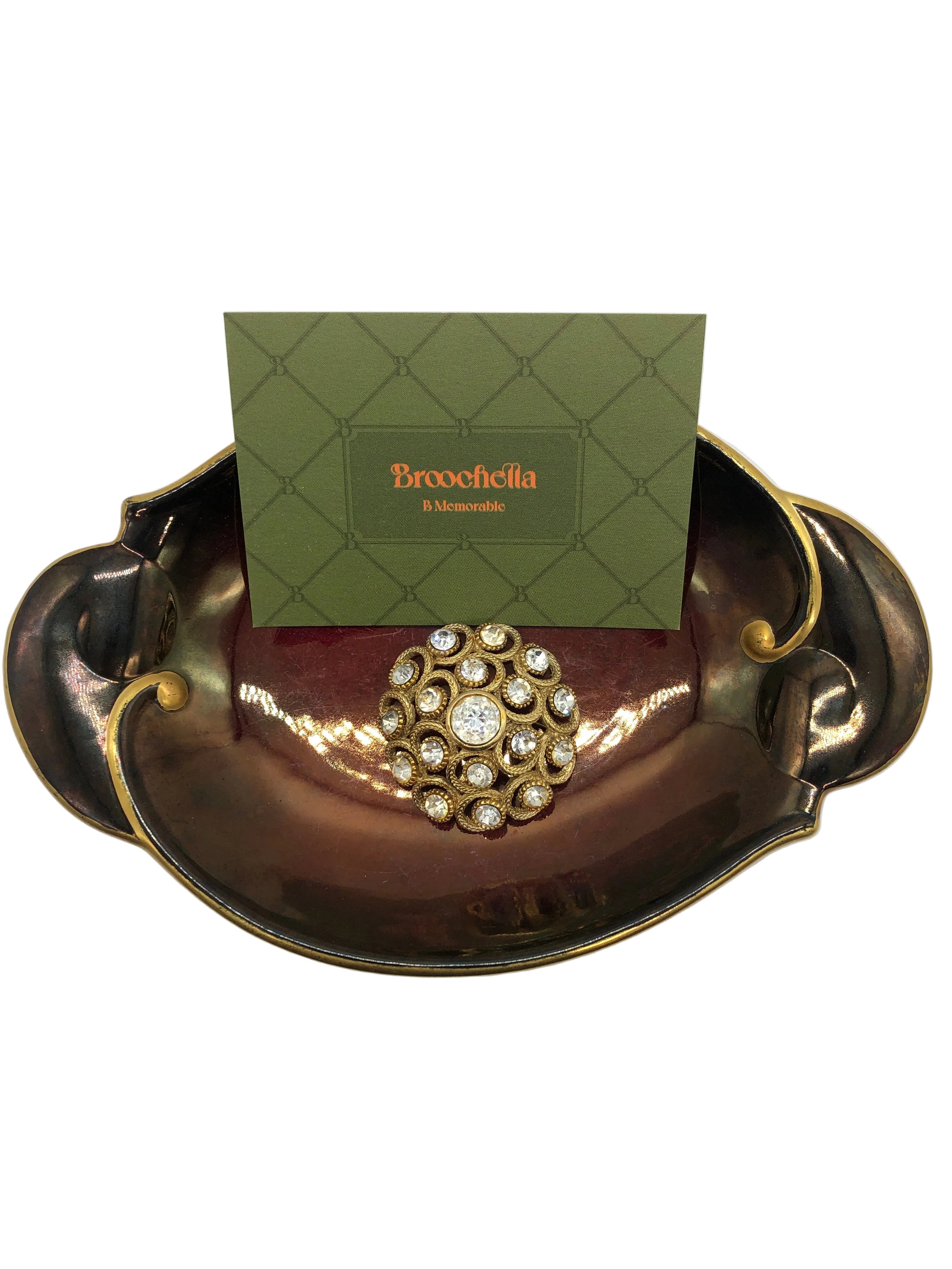 Vintage gold tone crystal cluster brooch with round rhinestones, floral swirl design, Paris-sourced statement piece by Broochella