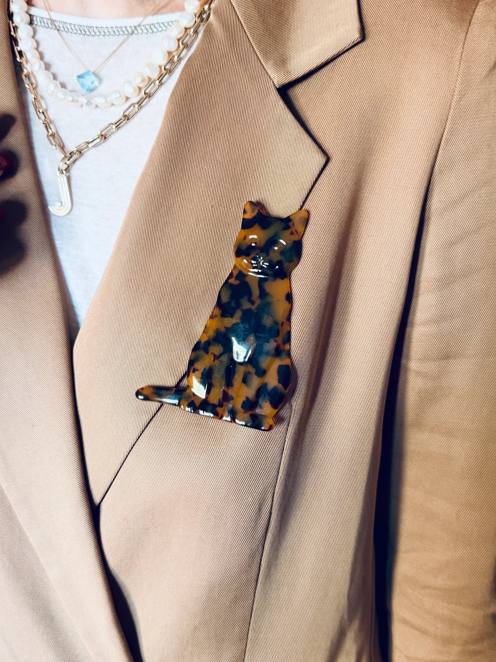 Broochella animalia cat brooch on model