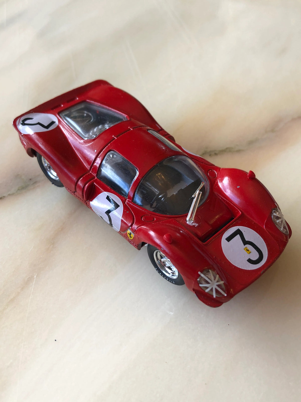 Broochella Men's Rosso Le Mans No.3 Ferrari Racing Car Brooch in glossy red, featuring a vintage endurance racing design, white number 3 decals, Ferrari shield emblem, clear cockpit canopy and chrome wheels.